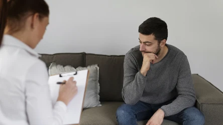 close-up-man-discussing-with-therapist-2(1)